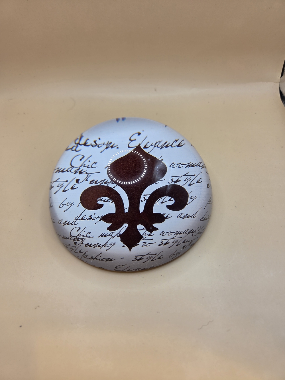 Decorative Fleur-de-Lis Glass Paperweight in White and Brown